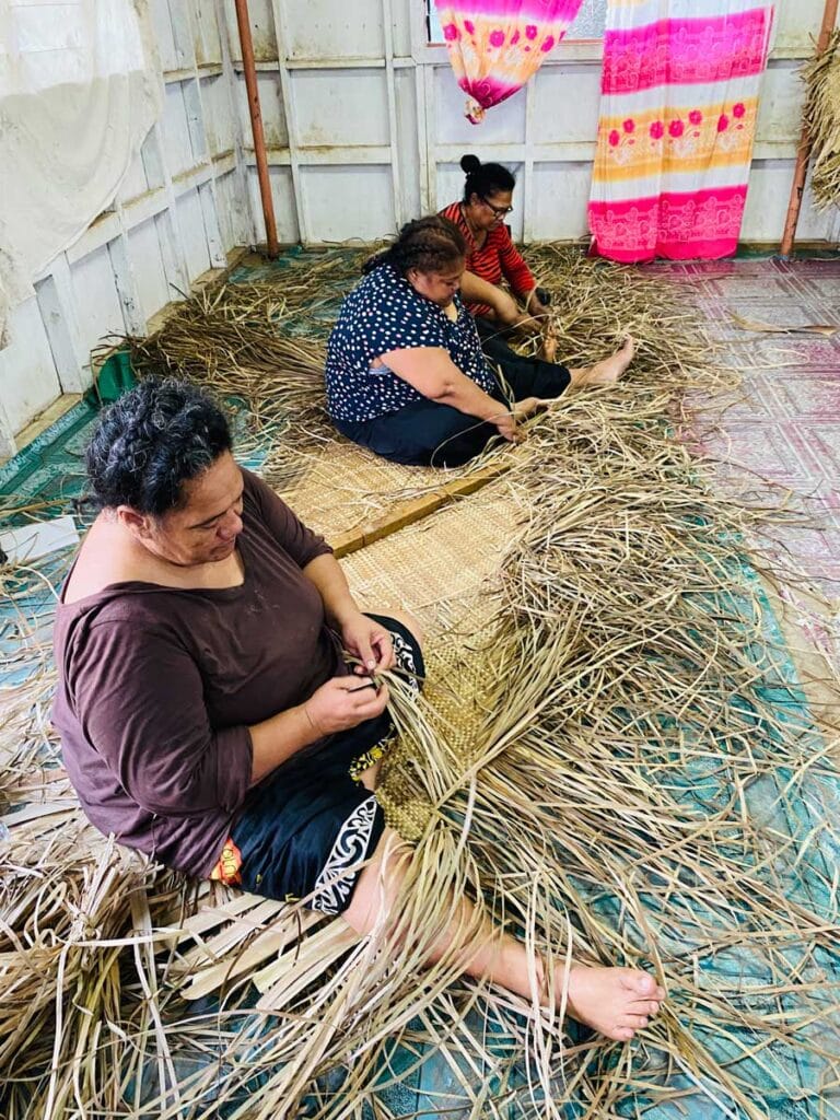 Women weaving pandanus leaves