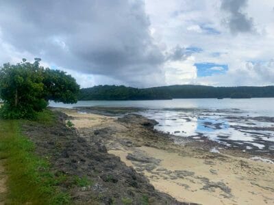 A coastline with hills in the distance